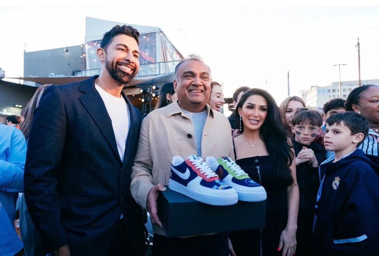 Dhar Mann pictured with YouTube CEO Neal Mohan after gifting Chummy's Customs